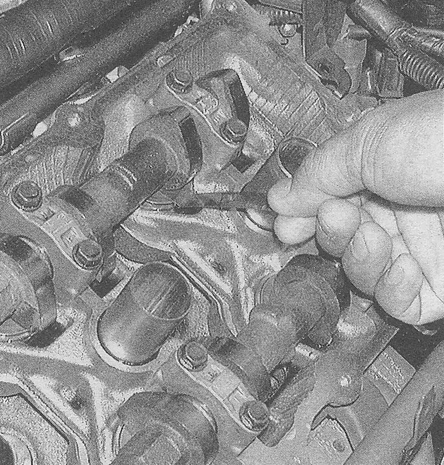 Ford Edge V6 engines_Valve clearance (3.5L and 3.7L engines) - check and adjustment_Measure the valve clearance for each valve with a feeler gauge of the specified thickness - if the clearance is correct, you should be able to feel a slight drag on the gauge as you pull it out